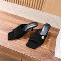 THE ROW 26S BUTTON DETAIL MULE SANDALS IN BLACK SUEDE