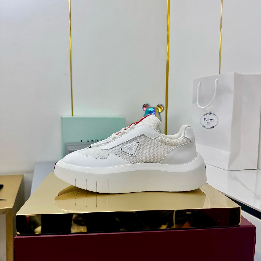 PRADA 25S CROSS LACED SNEAKERS IN WHITE CALFSKIN