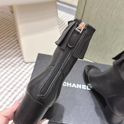 CHANEL 25S ANKLE BOOTS IN BLACK CALFSKIN GLOSSY TOE RUCHED
