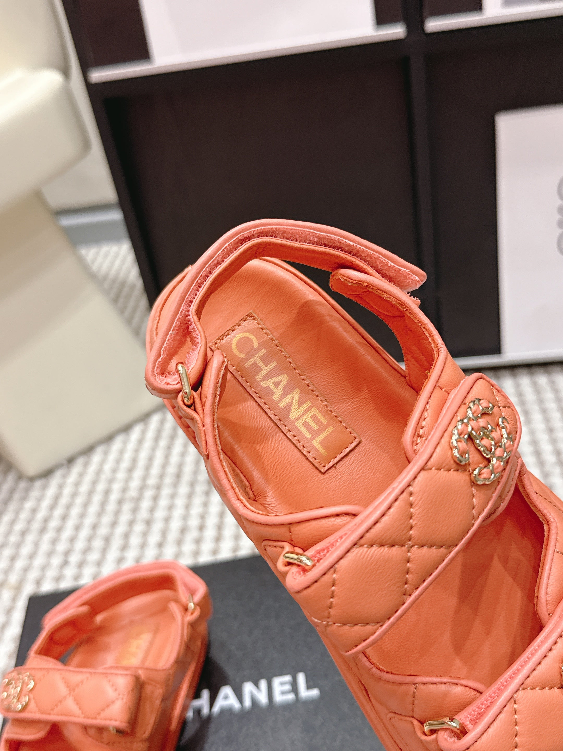 CHANEL 26S QUILTED DAD SANDALS IN ORANGE CALFSKIN