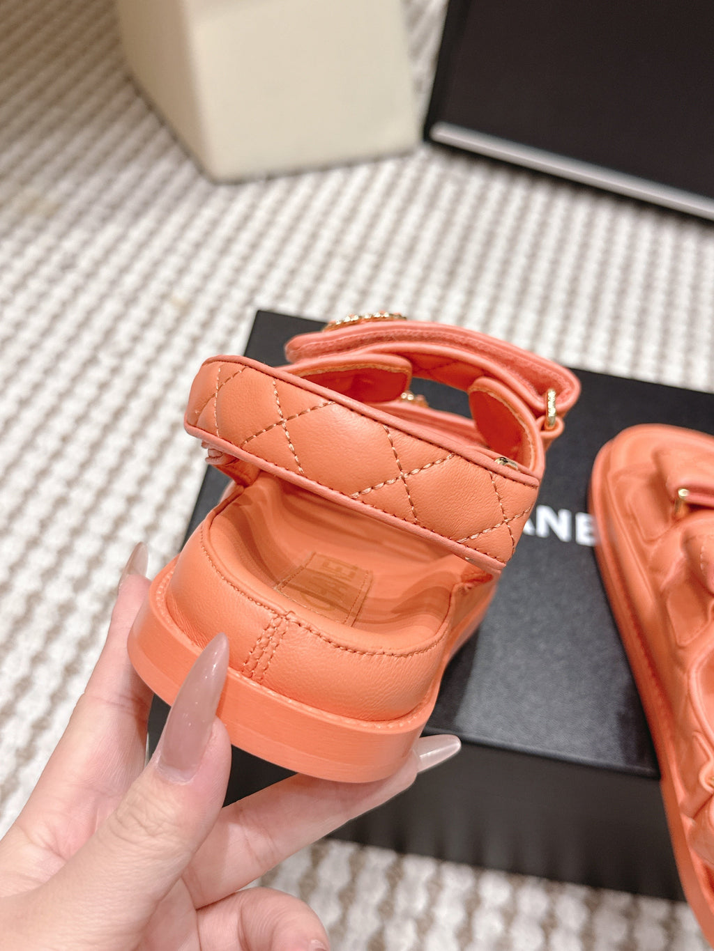 CHANEL 26S QUILTED DAD SANDALS IN ORANGE CALFSKIN