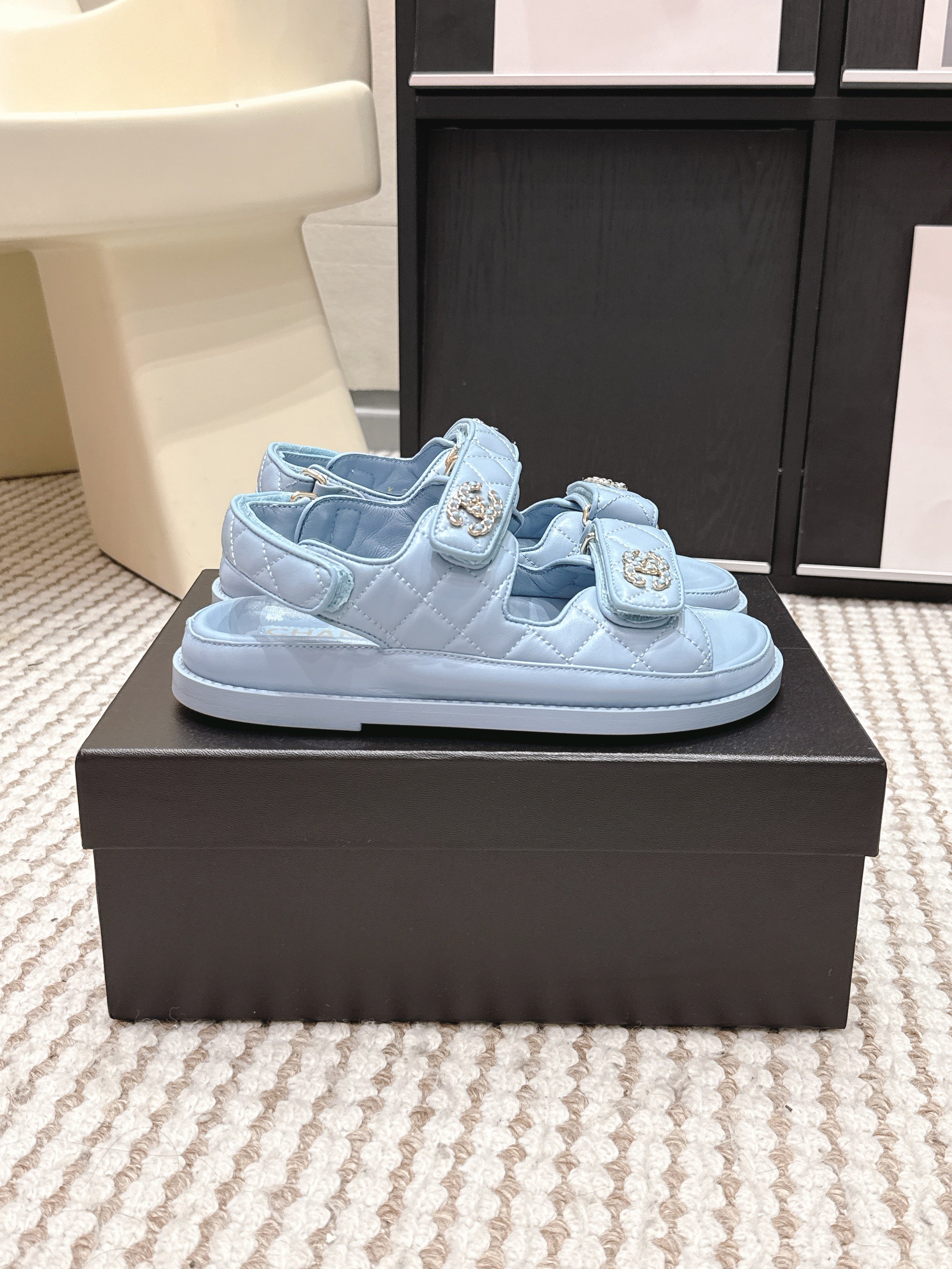 CHANEL 26S QUILTED DAD SANDALS IN LIGHT BLUE CALFSKIN