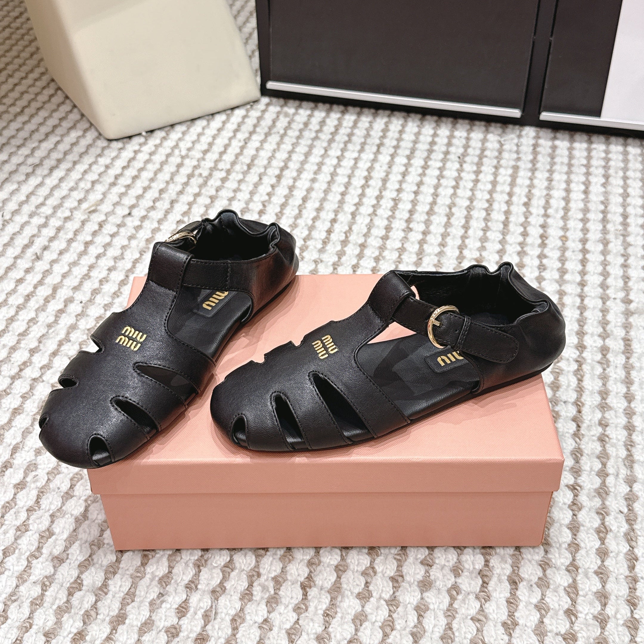 MIUMIU 26S RUCHES FISHERMAN SANDALS IN BLACK CALFSKIN GOLD HARDWARE
