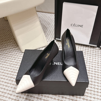 CHANEL 26S HIGH HEELS IN BLACK LAMBSKIN WITH WHITE CHEVRON-QUILTED TOE