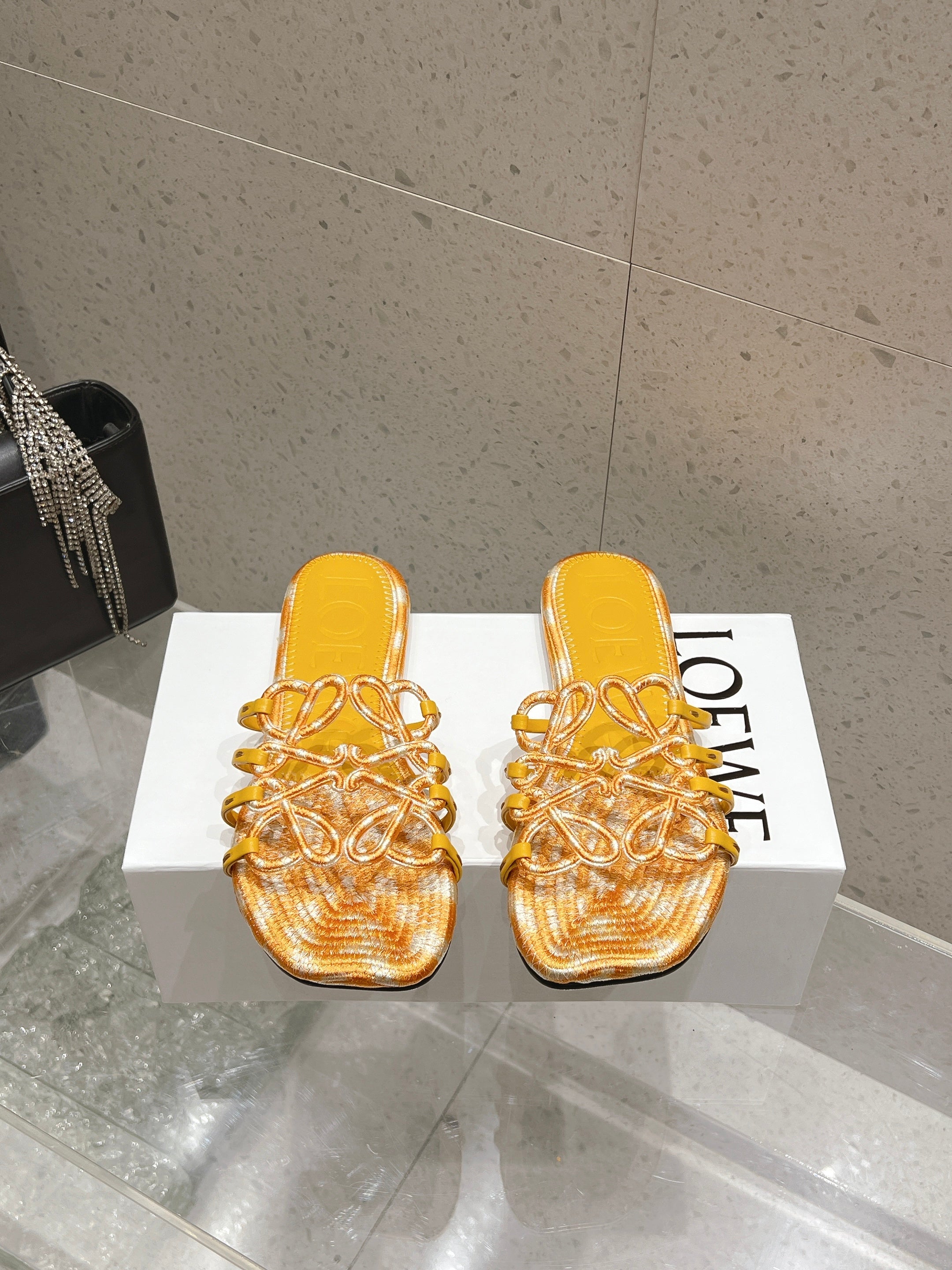 LOEWE 26S BRAIDED CAGE SLIDE SANDALS IN YELLOW CALFSKIN