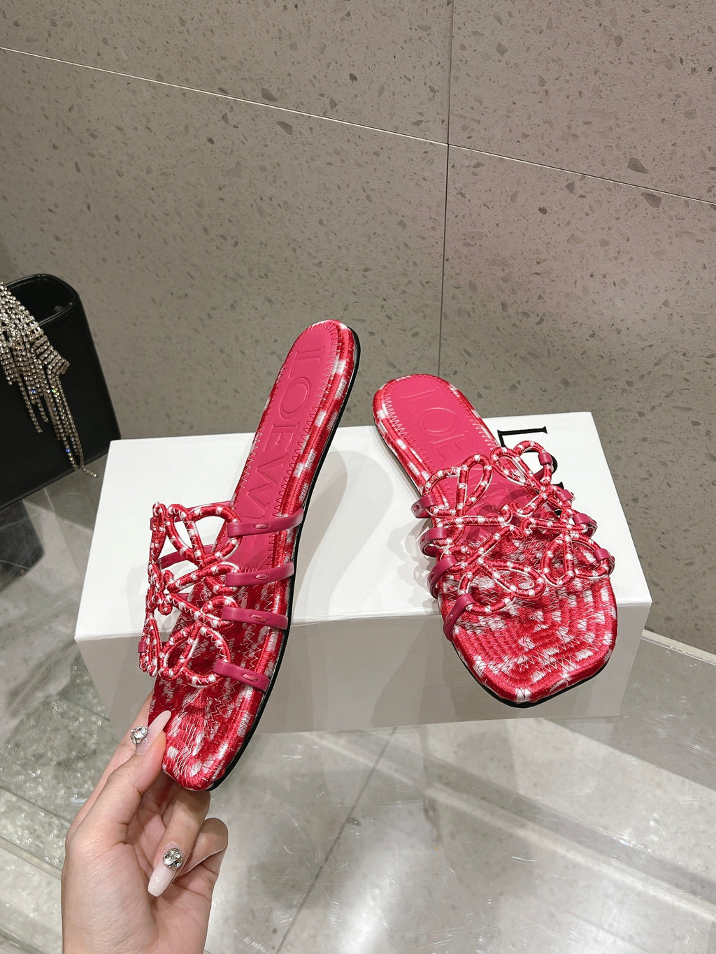LOEWE 26S BRAIDED CAGE SLIDE SANDALS IN CORAL PINK CALFSKIN