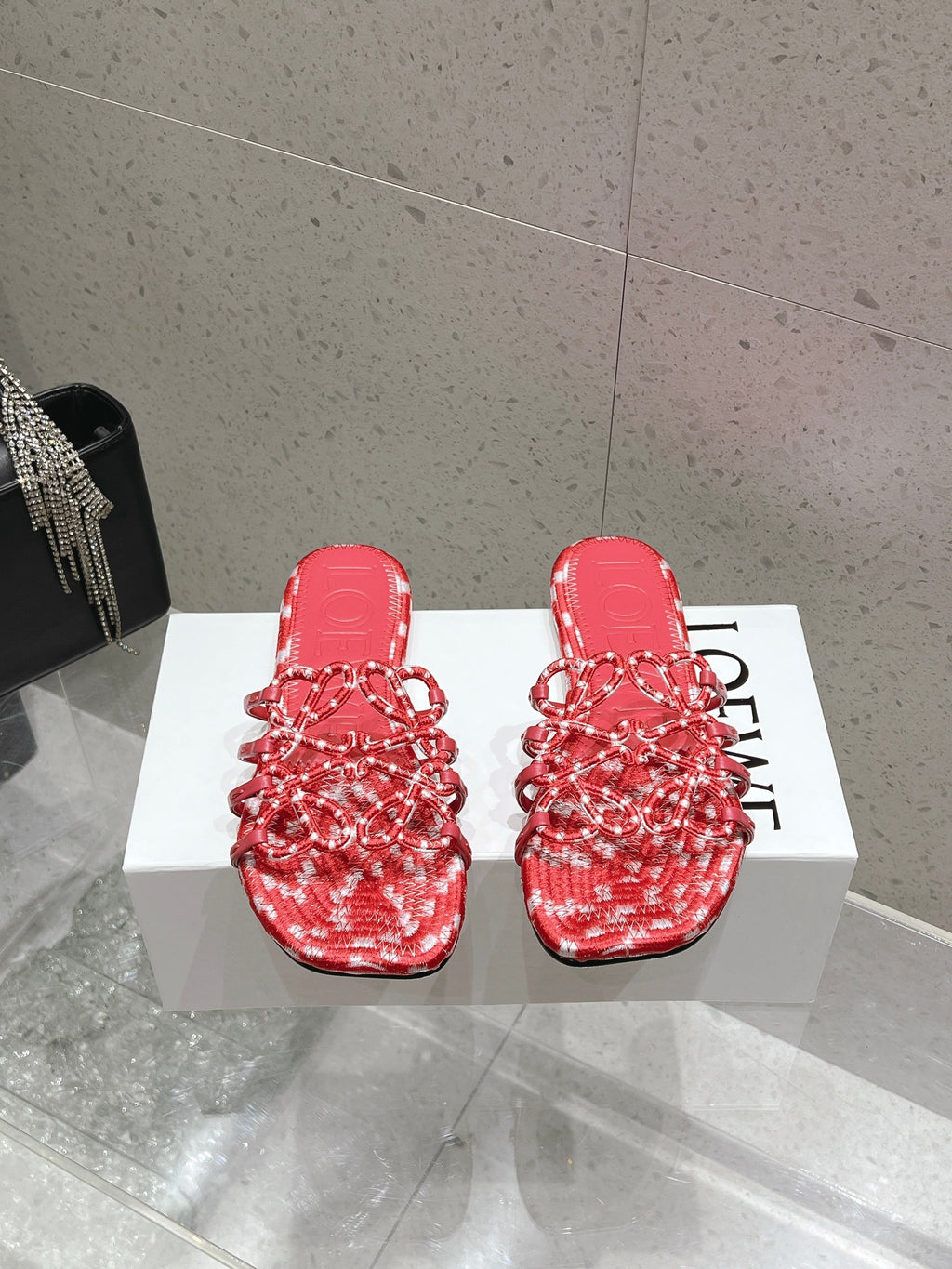 LOEWE 26S BRAIDED CAGE SLIDE SANDALS IN CORAL PINK CALFSKIN