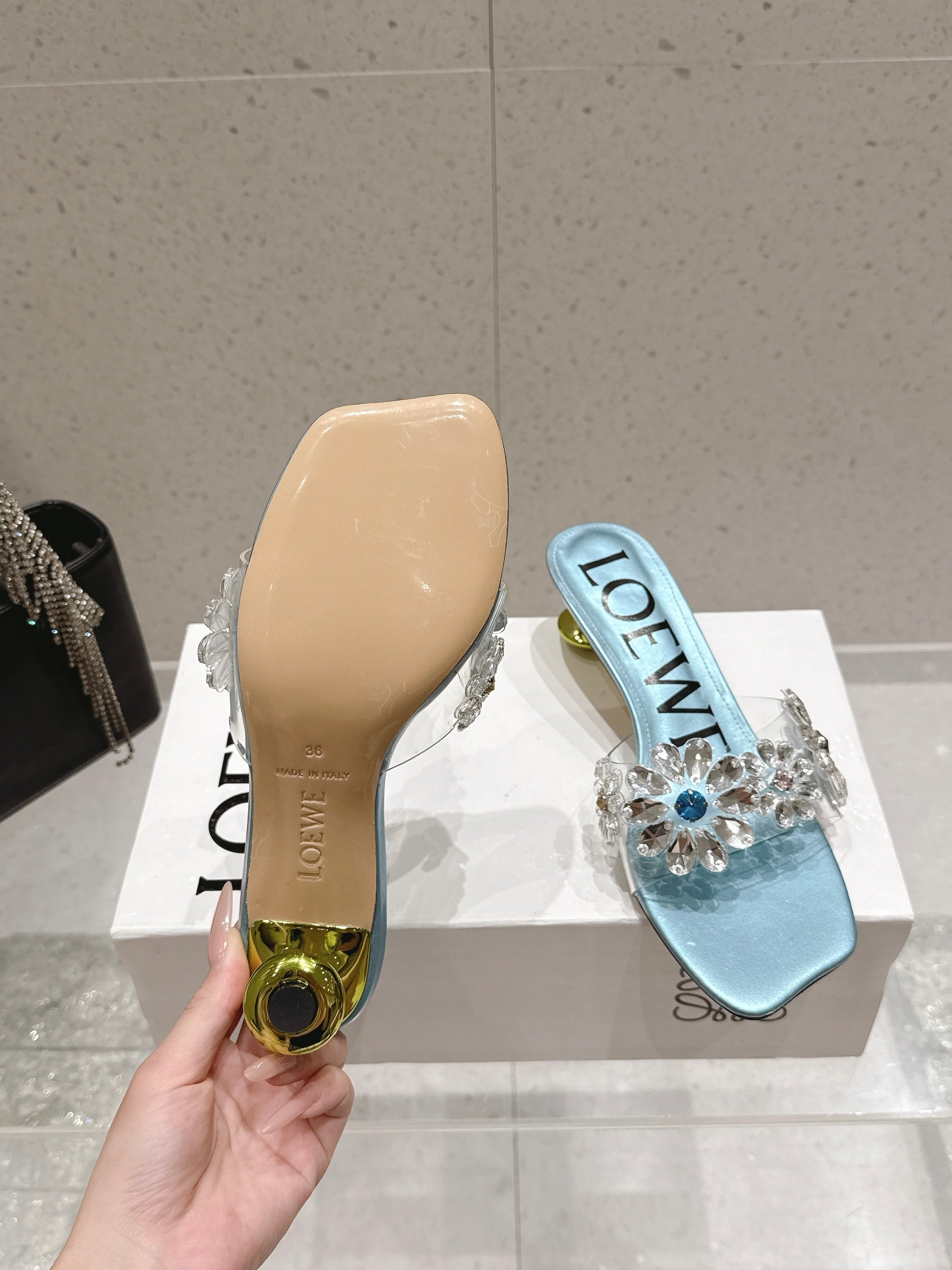 LOEWE 26S MULE HEELS 45MM IN LIGHT BLUE PVC WITH CRYSTAL FLORAL