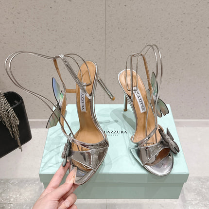 AQUAZZURA 26S BUTTERFLY HEEL SANDALS 100 MM IN SILVER CALFSKIN