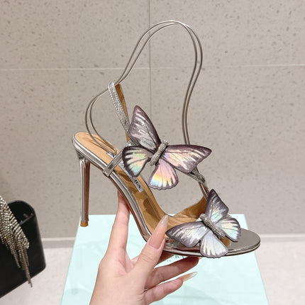 AQUAZZURA 26S BUTTERFLY HEEL SANDALS 100 MM IN SILVER CALFSKIN