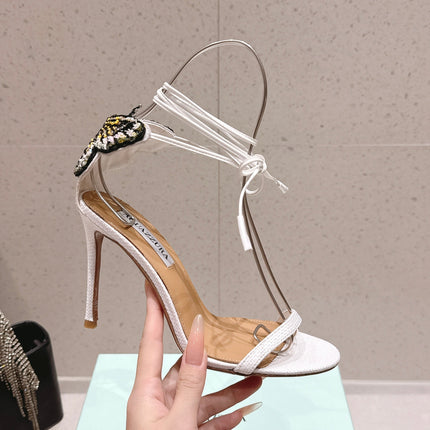 AQUAZZURA 26S BUTTERFLY LACE-UP HEELS 100 MM IN WHITE WOVEN TEXTURE