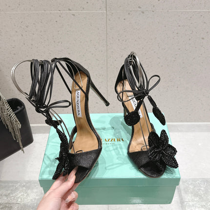 AQUAZZURA 26S FLORAL HEELS 100 MM IN BLACK WOVEN RAFFIA