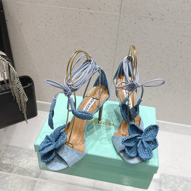 AQUAZZURA 26S FLORAL HEELS 100 MM IN PASTEL BLUE WOVEN RAFFIA AND FABRIC