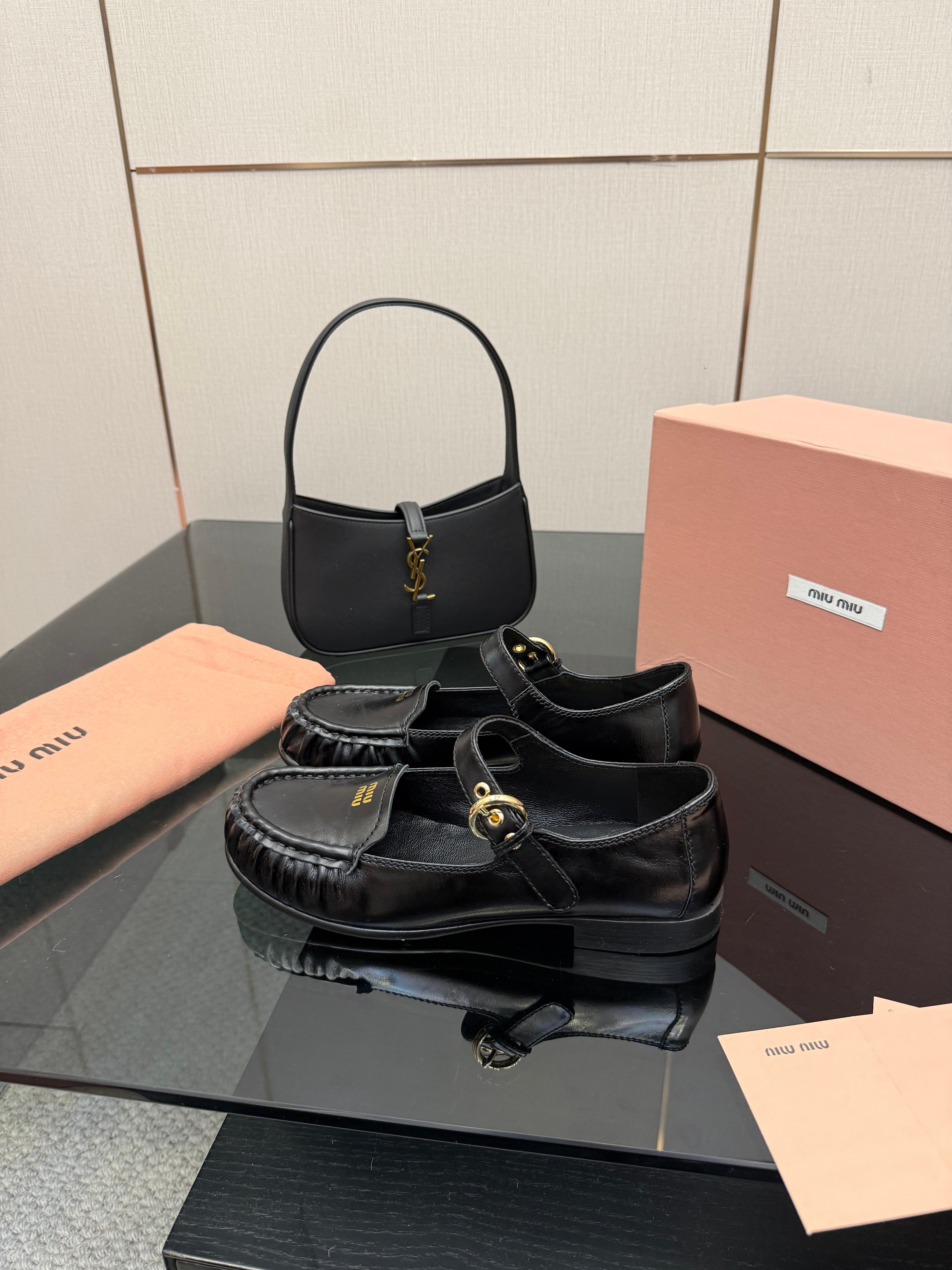 MIUMIU 25S LOAFERS WITH STRAP IN BLACK LAMBSKIN