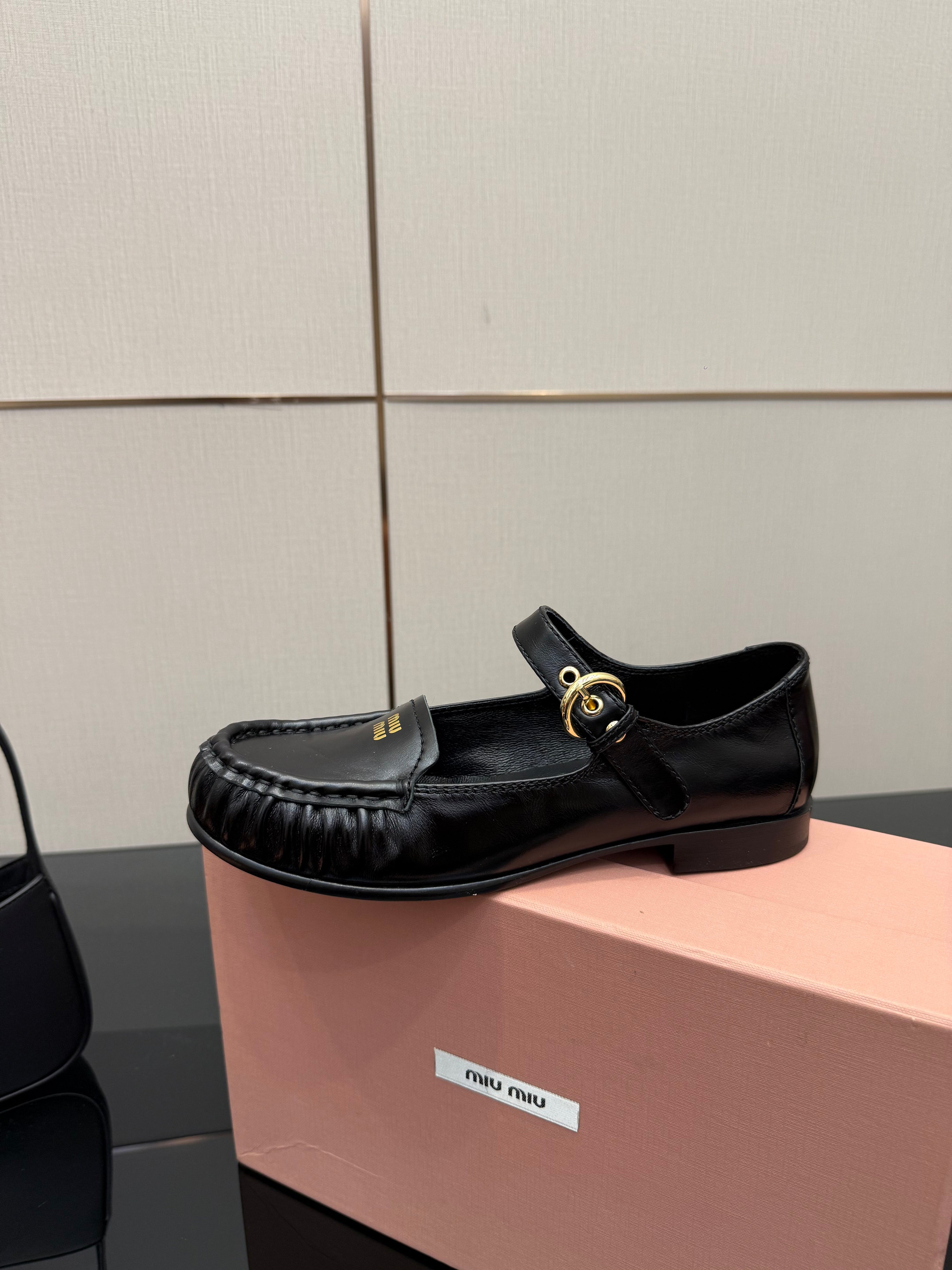 MIUMIU 25S LOAFERS WITH STRAP IN BLACK LAMBSKIN