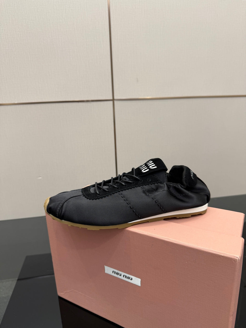 MIUMIU 25S SNEAKERS IN BLACK PLUME SATIN