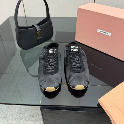 MIUMIU 25S SNEAKERS IN BLACK PLUME SATIN
