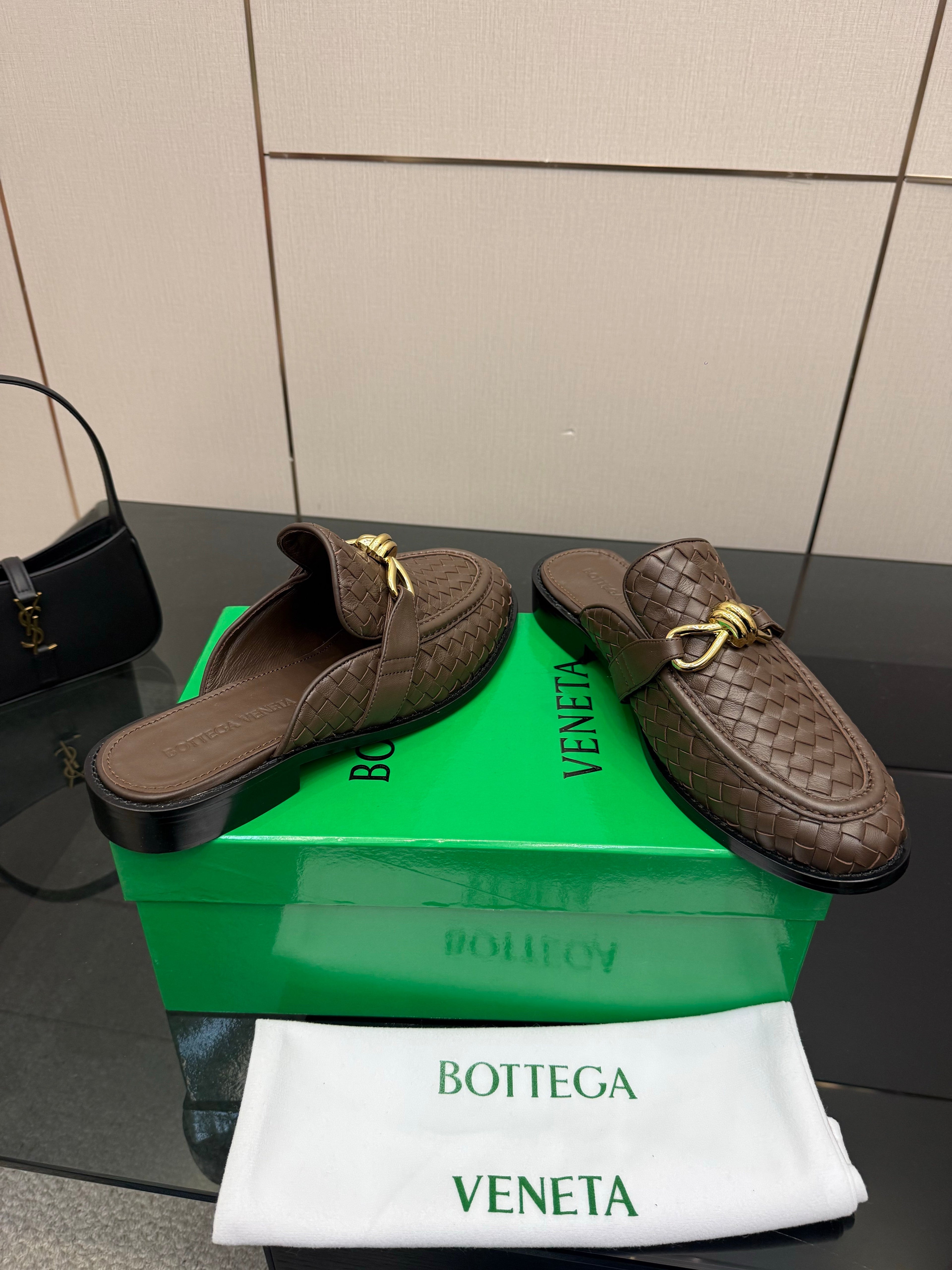 BOTTEGA VENETA 26S BACKLESS LOAFERS IN BROWN TECHNICAL WOVEN CALFSKIN
