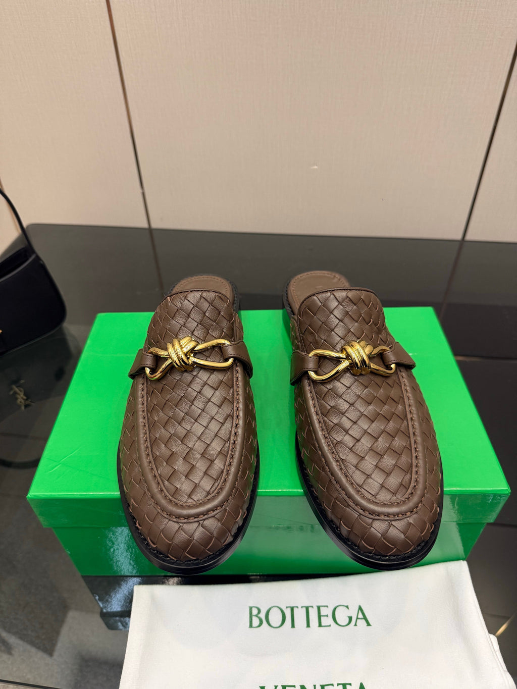 BOTTEGA VENETA 26S BACKLESS LOAFERS IN BROWN TECHNICAL WOVEN CALFSKIN