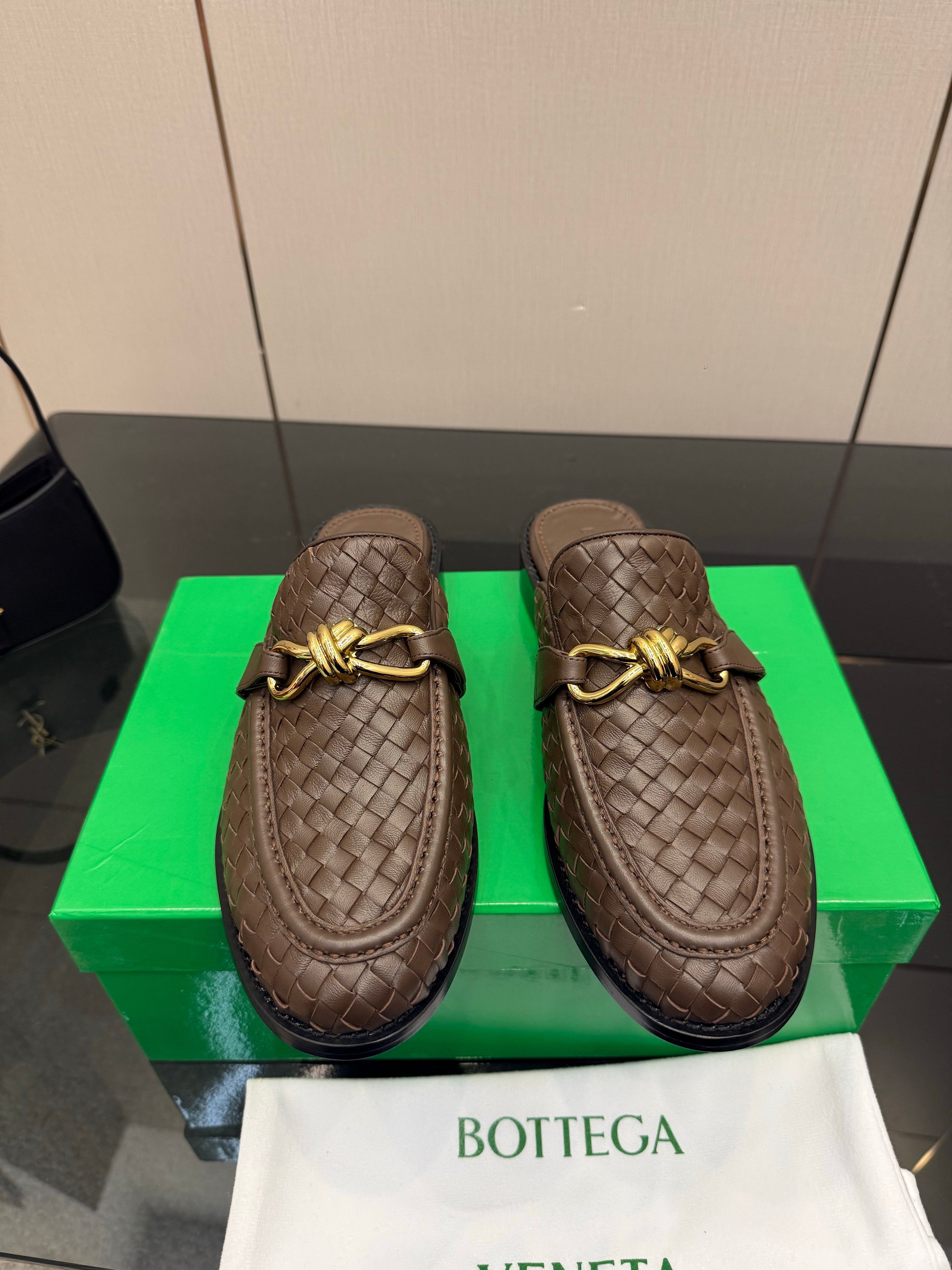 BOTTEGA VENETA 26S BACKLESS LOAFERS IN BROWN TECHNICAL WOVEN CALFSKIN