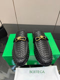 BOTTEGA VENETA 26S BACKLESS LOAFERS IN BLACK TECHNICAL WOVEN CALFSKIN