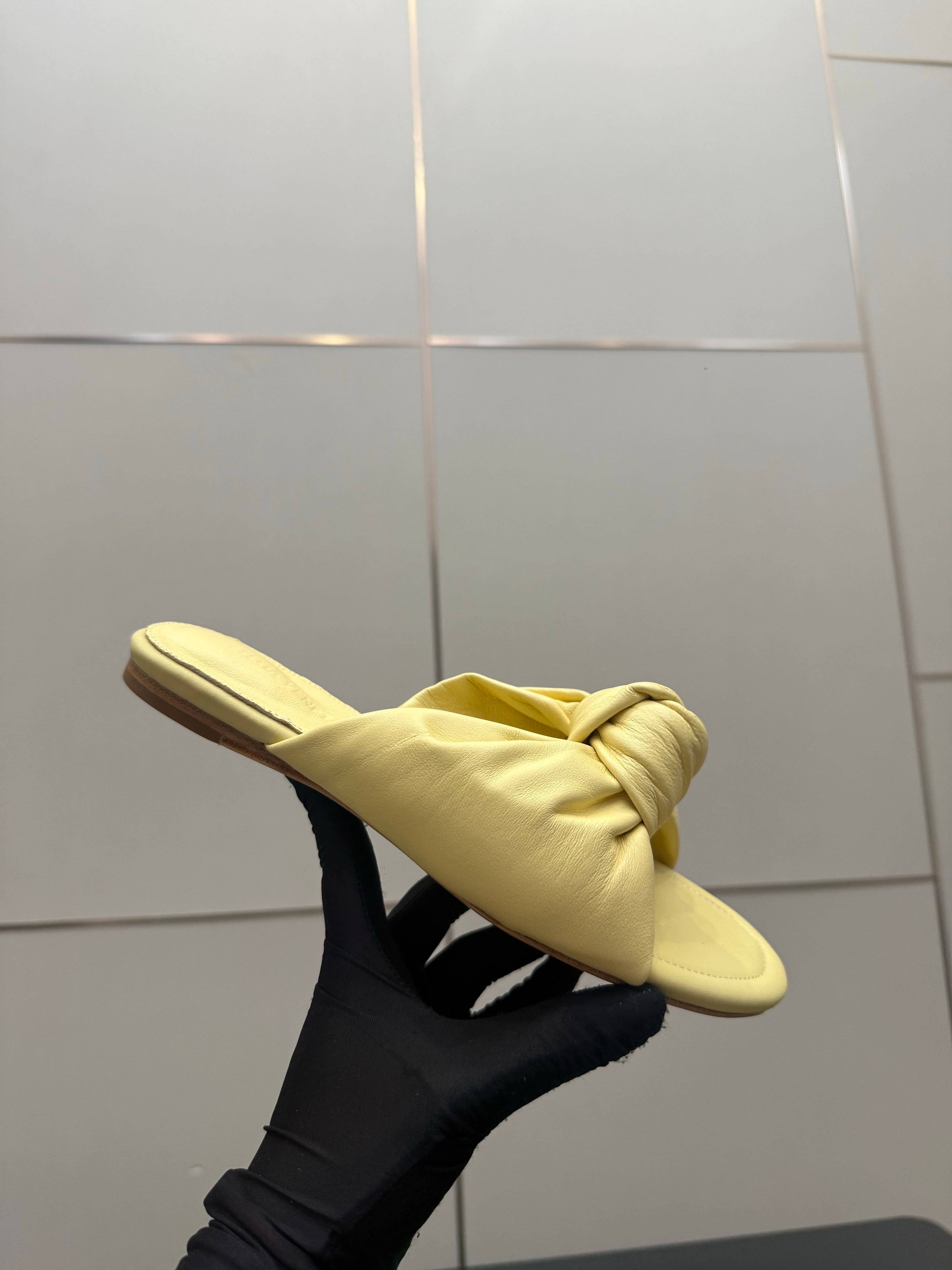 BOTTEGA VENETA 26S SLIDE SANDALS IN YELLOW LAMBSKIN