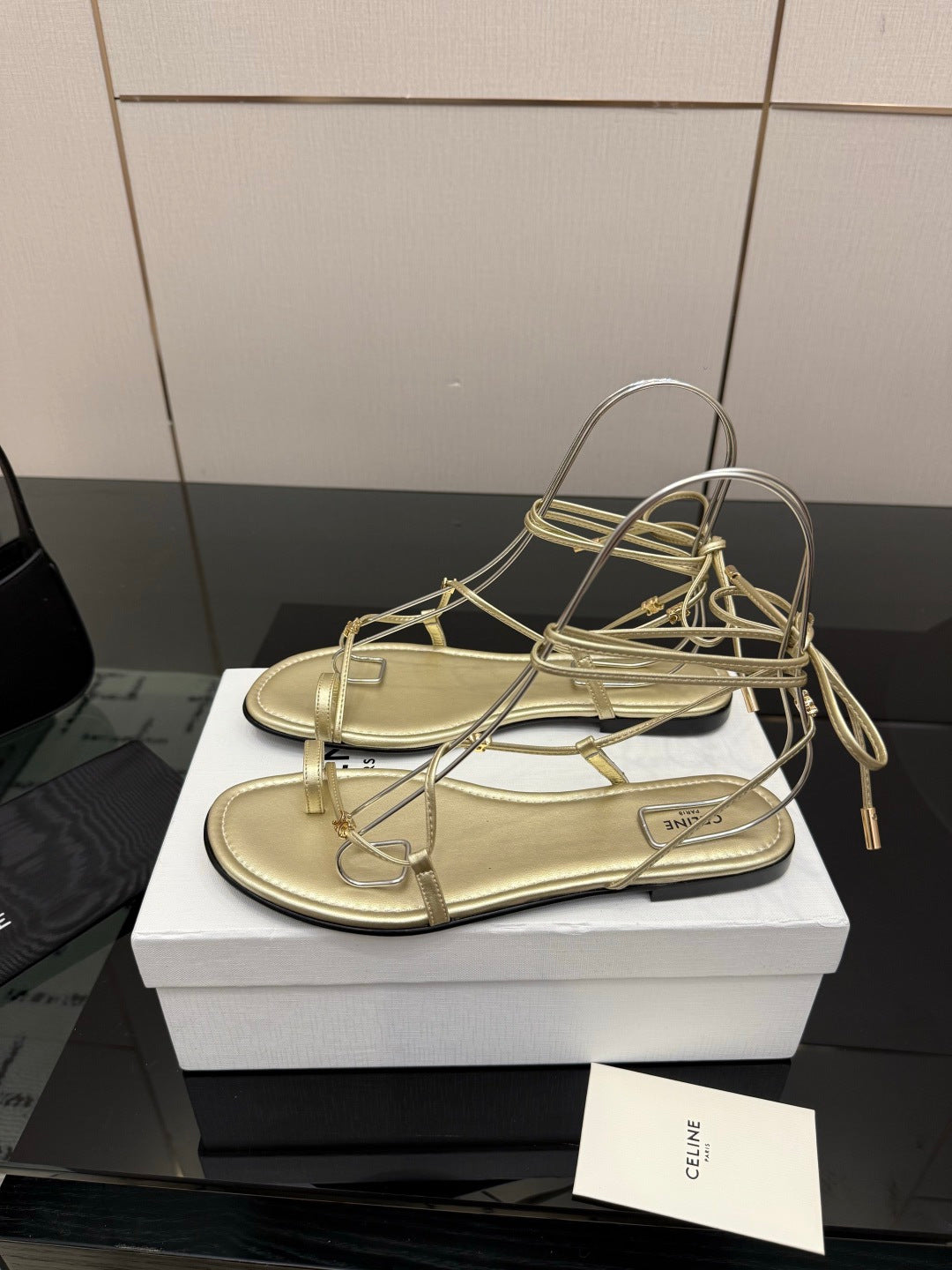 CELINE 26S TRIOMPHE LACE UP FLAT SANDALS IN GOLD CALFSKIN