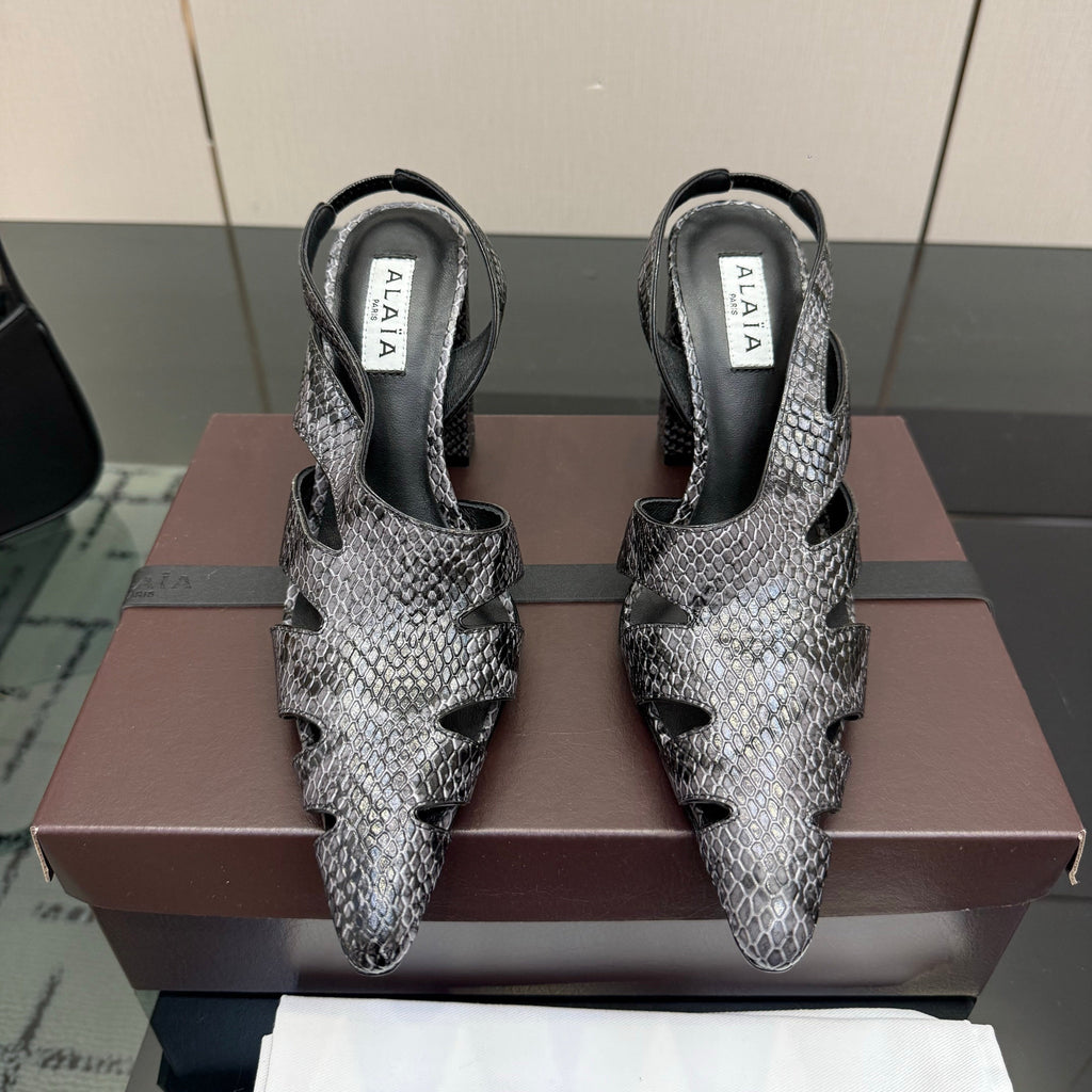 ALAIA 26S HEELED SLINGBACKS IN BLACK PYTHON-EMBOSSED LEATHER