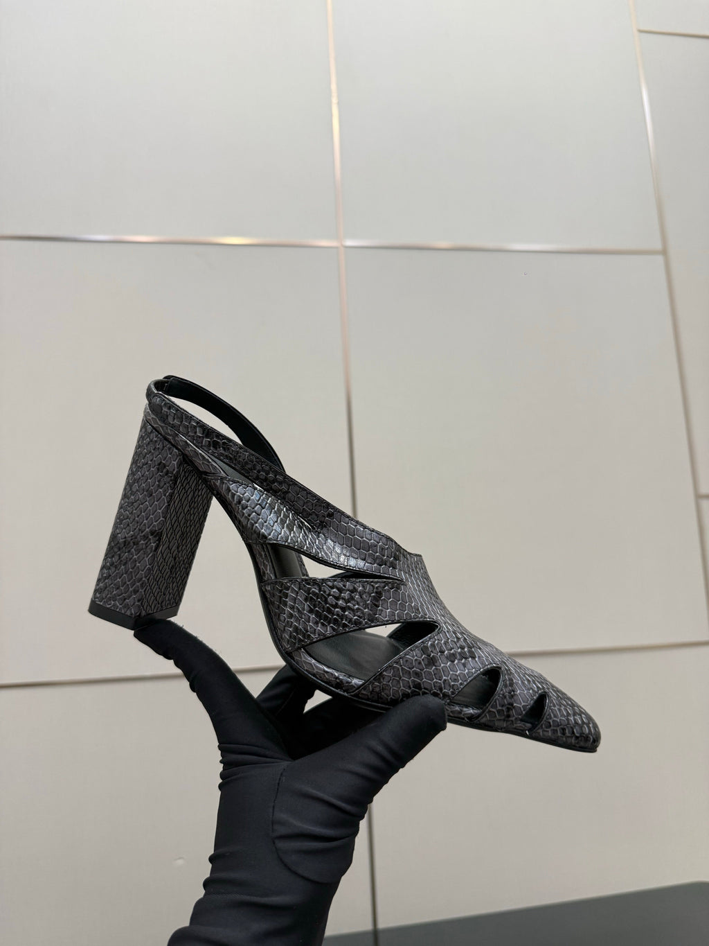 ALAIA 26S HEELED SLINGBACKS IN BLACK PYTHON-EMBOSSED LEATHER