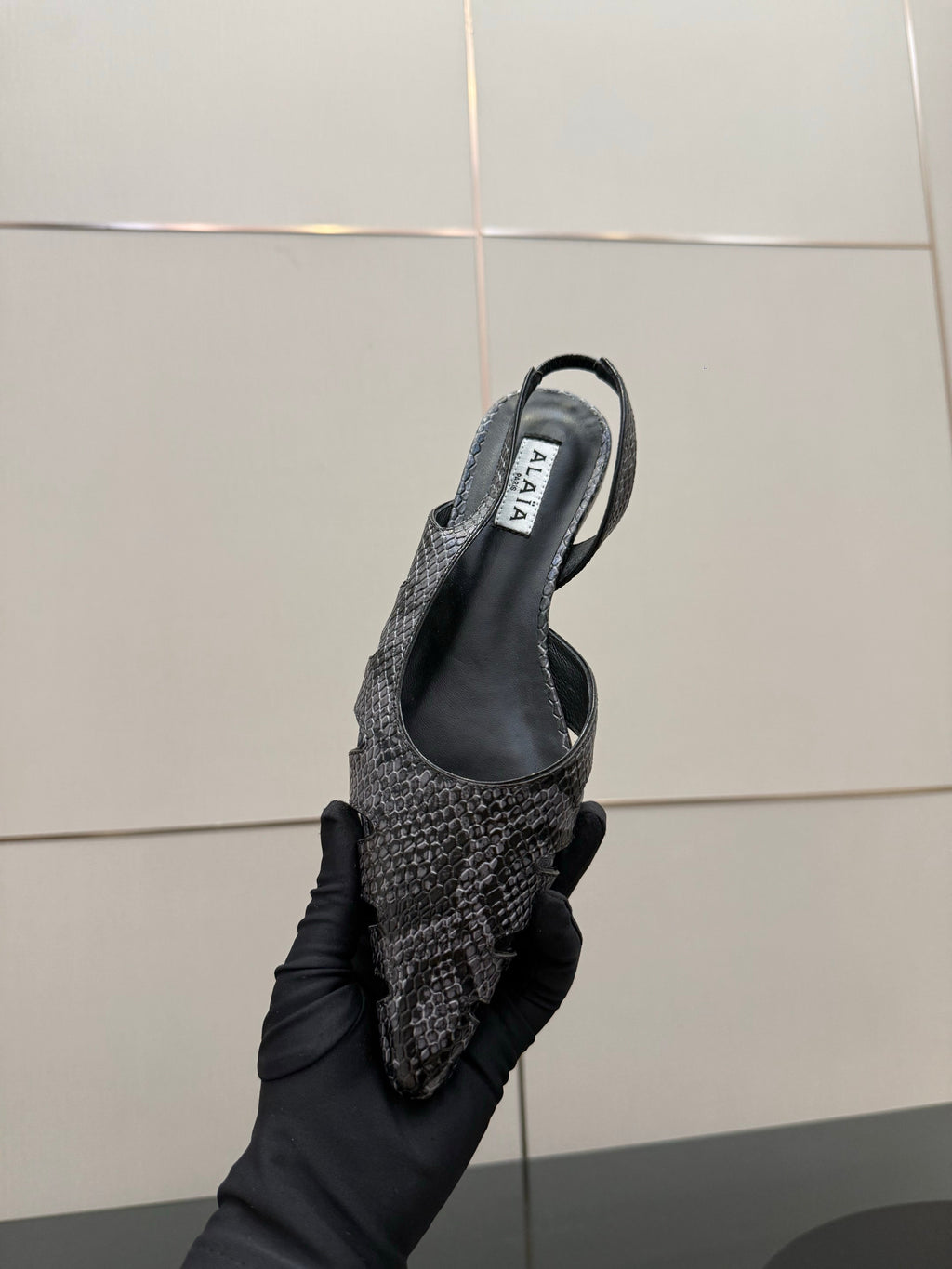 ALAIA 26S CUT-OUT SLINGBACK FLATS IN BLACK PYTHON-EMBOSSED LEATHER