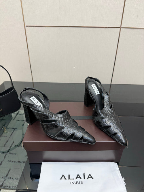 ALAIA 26S HEELED SLINGBACKS IN BLACK CROC-EMBOSSED LEATHER
