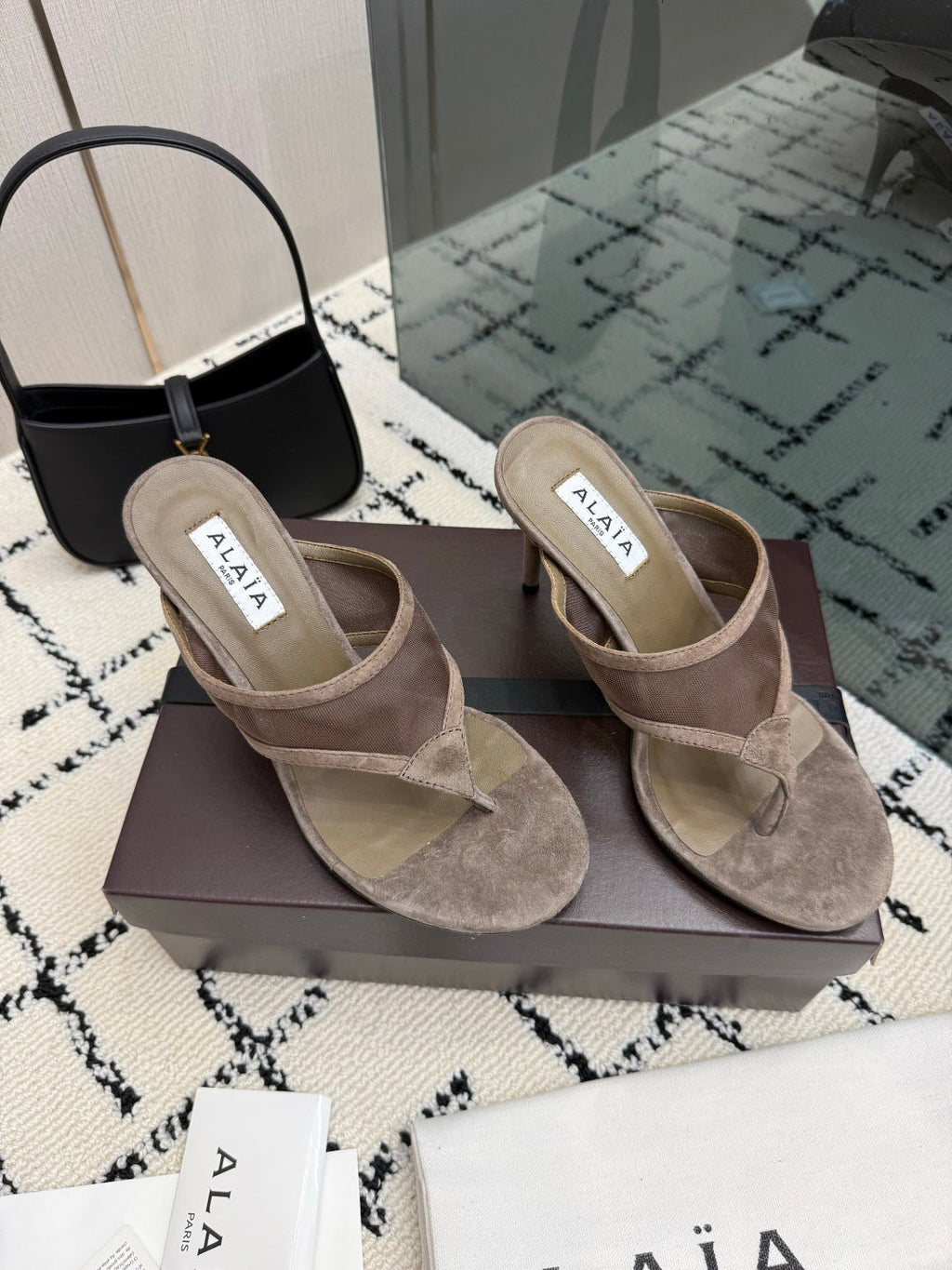 ALAIA 26S HEELED THONG MULE SANDALS IN TAUPE SUEDE