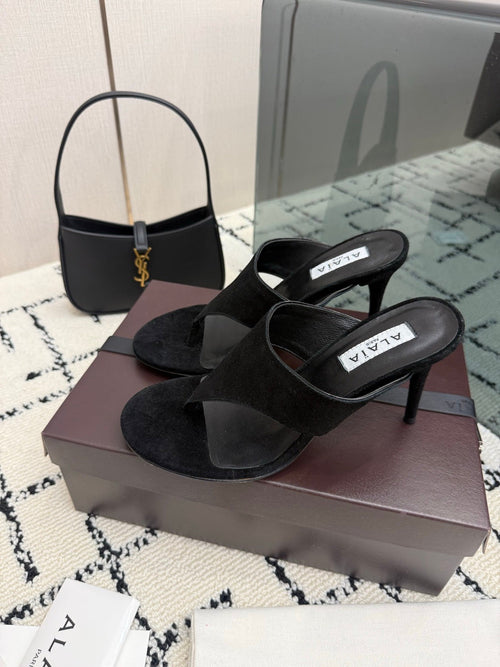 ALAIA 26S HEELED THONG MULE SANDALS IN BLACK SUEDE