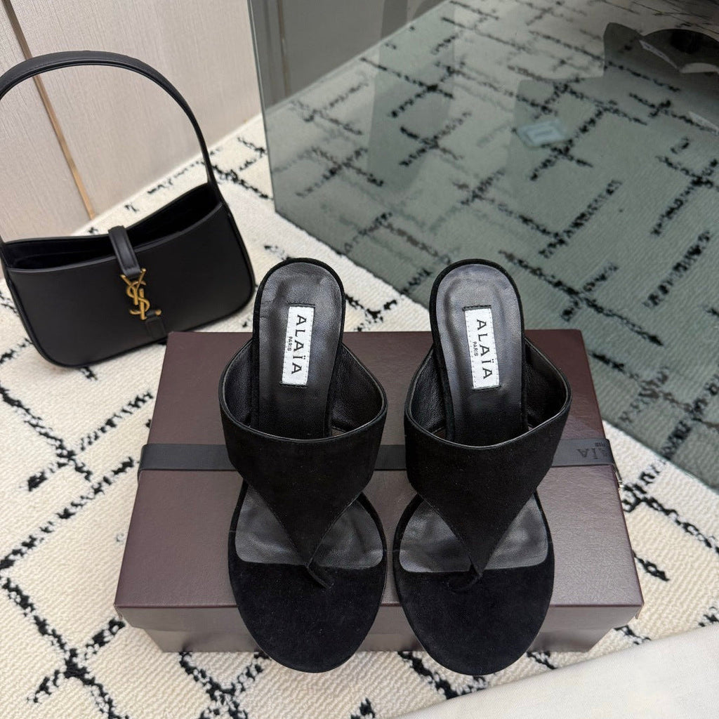 ALAIA 26S HEELED THONG MULE SANDALS IN BLACK SUEDE