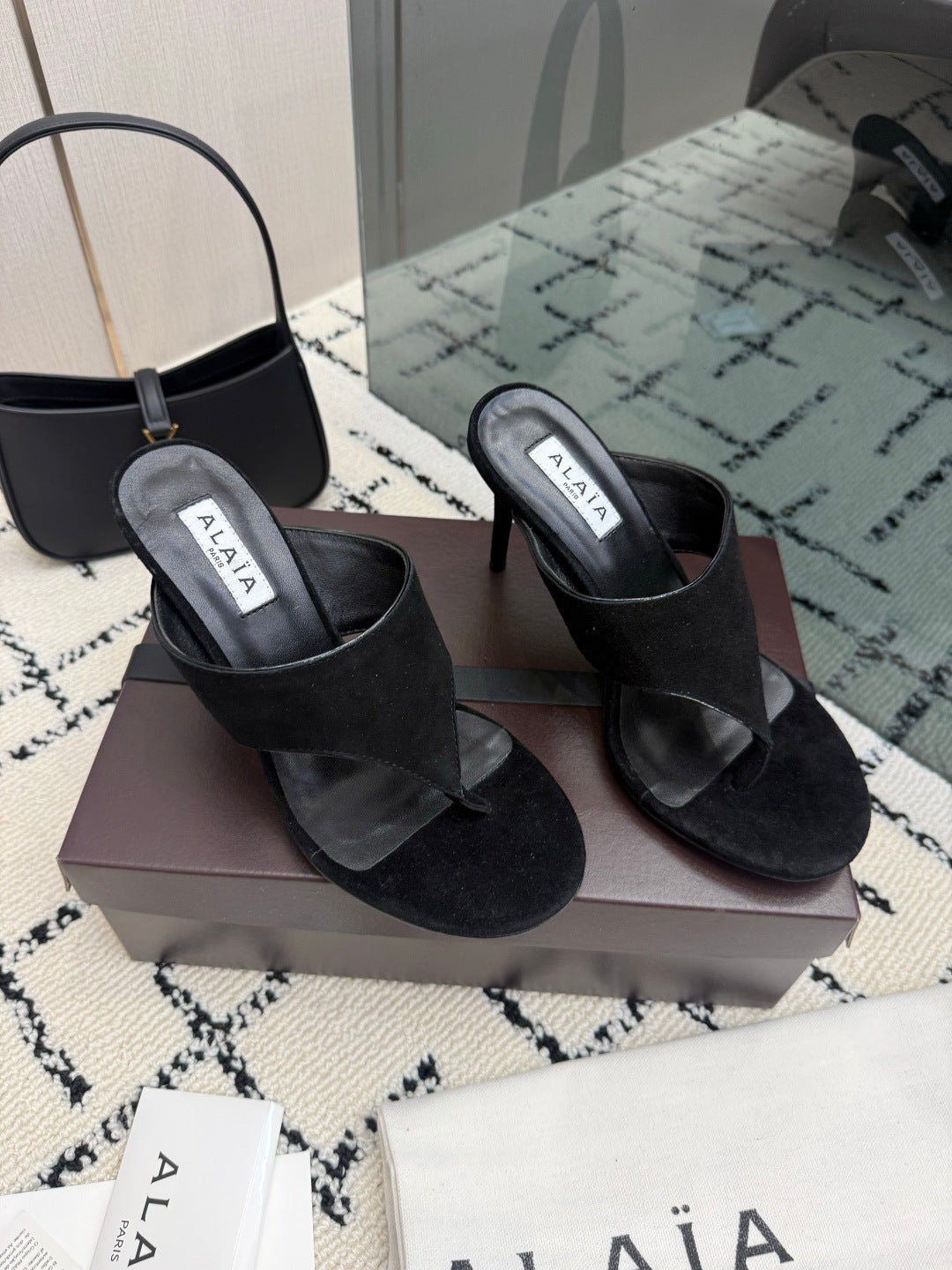 ALAIA 26S HEELED THONG MULE SANDALS IN BLACK SUEDE