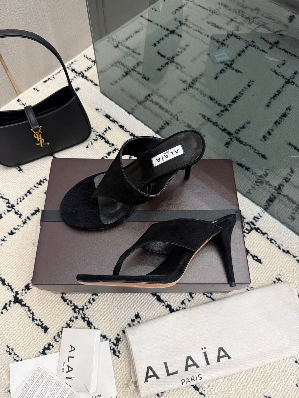 ALAIA 26S HEELED THONG MULE SANDALS IN BLACK SUEDE
