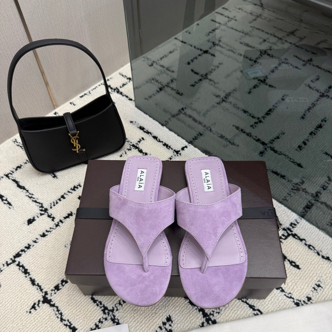 ALAIA 26S THONG MULE SANDALS IN PURPLE SUEDE