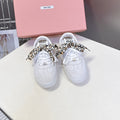 MIUMIU 25S SNEAKERS IN WHITE SUEDE WITH LEOPARD-PRINT LACES