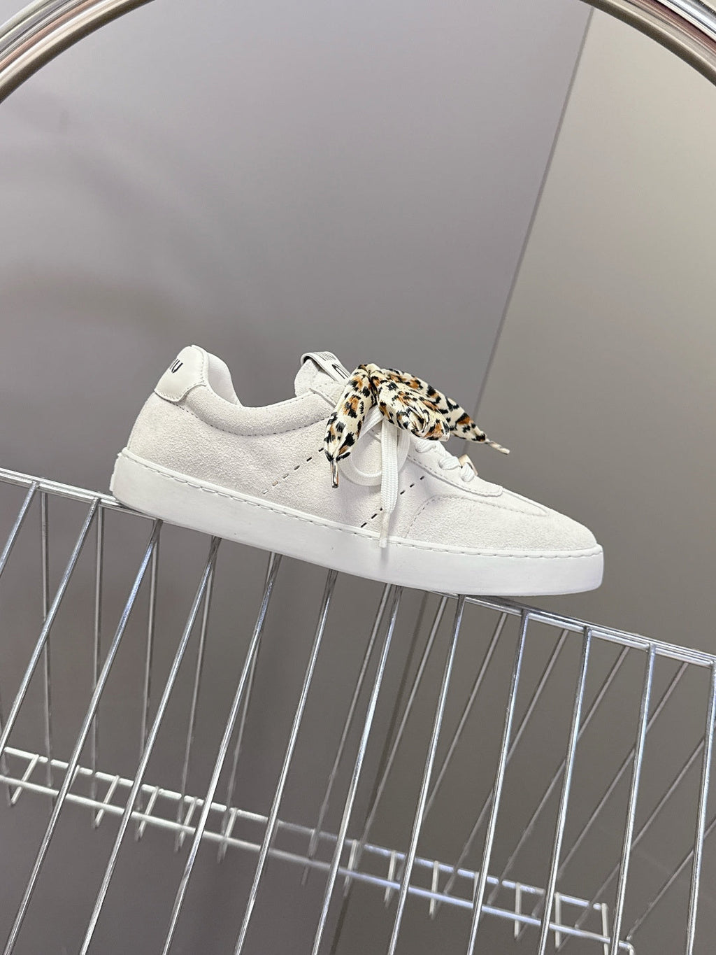 MIUMIU 25S SNEAKERS IN WHITE SUEDE WITH LEOPARD-PRINT LACES