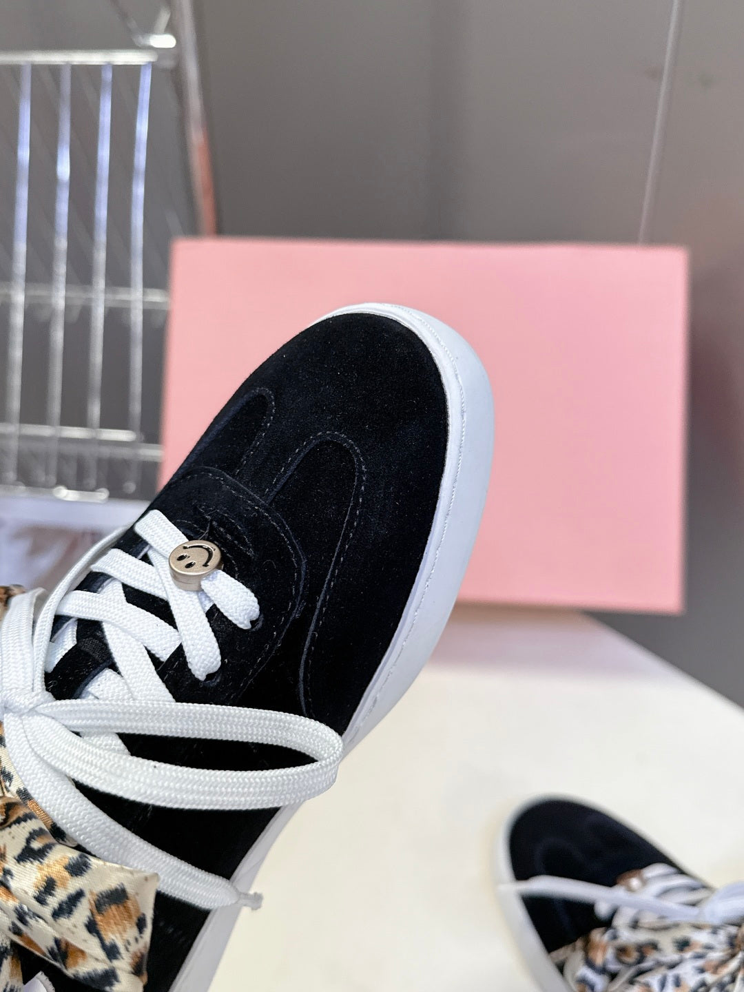MIUMIU 25S SNEAKERS IN BLACK SUEDE WITH LEOPARD-PRINT LACES