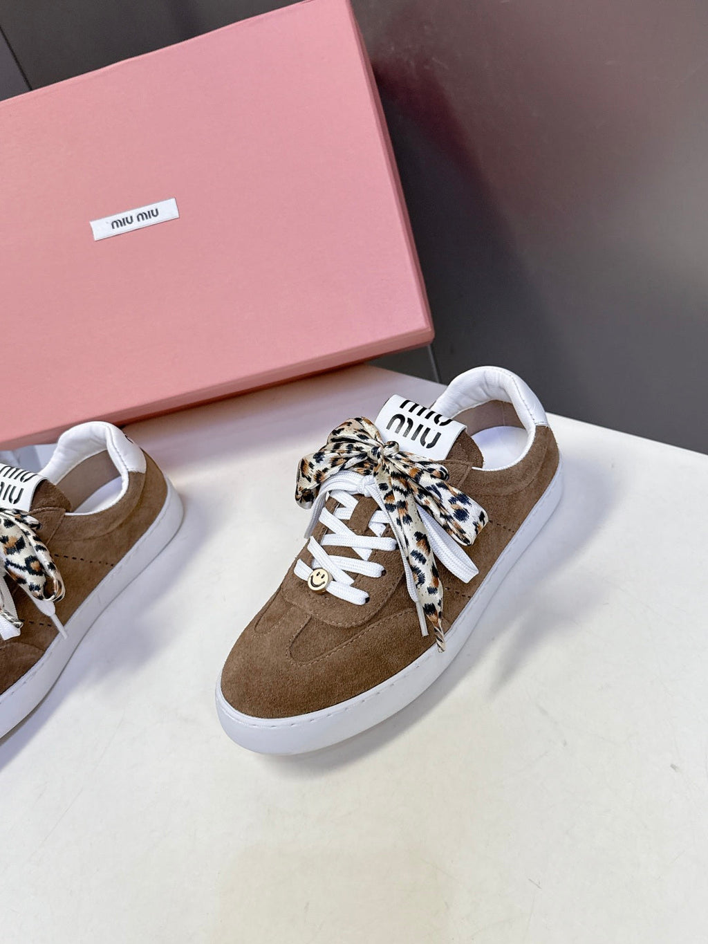 MIUMIU 25S SNEAKERS IN EARTH BROWN SUEDE WITH LEOPARD-PRINT LACES
