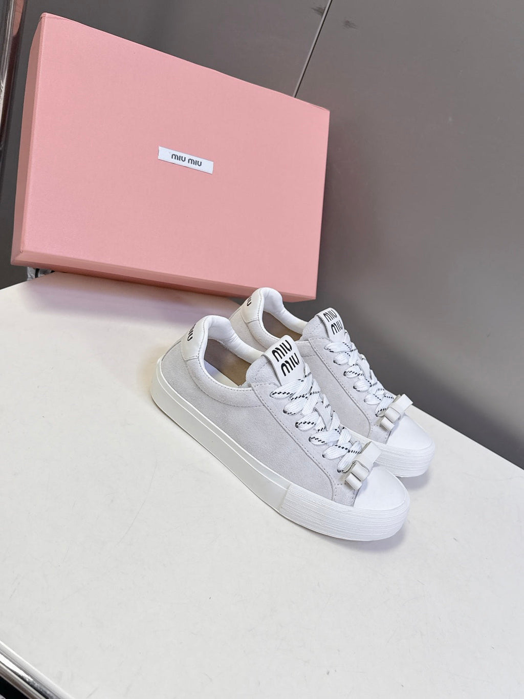 MIUMIU 25S SNEAKERS IN WHITE SUEDE
