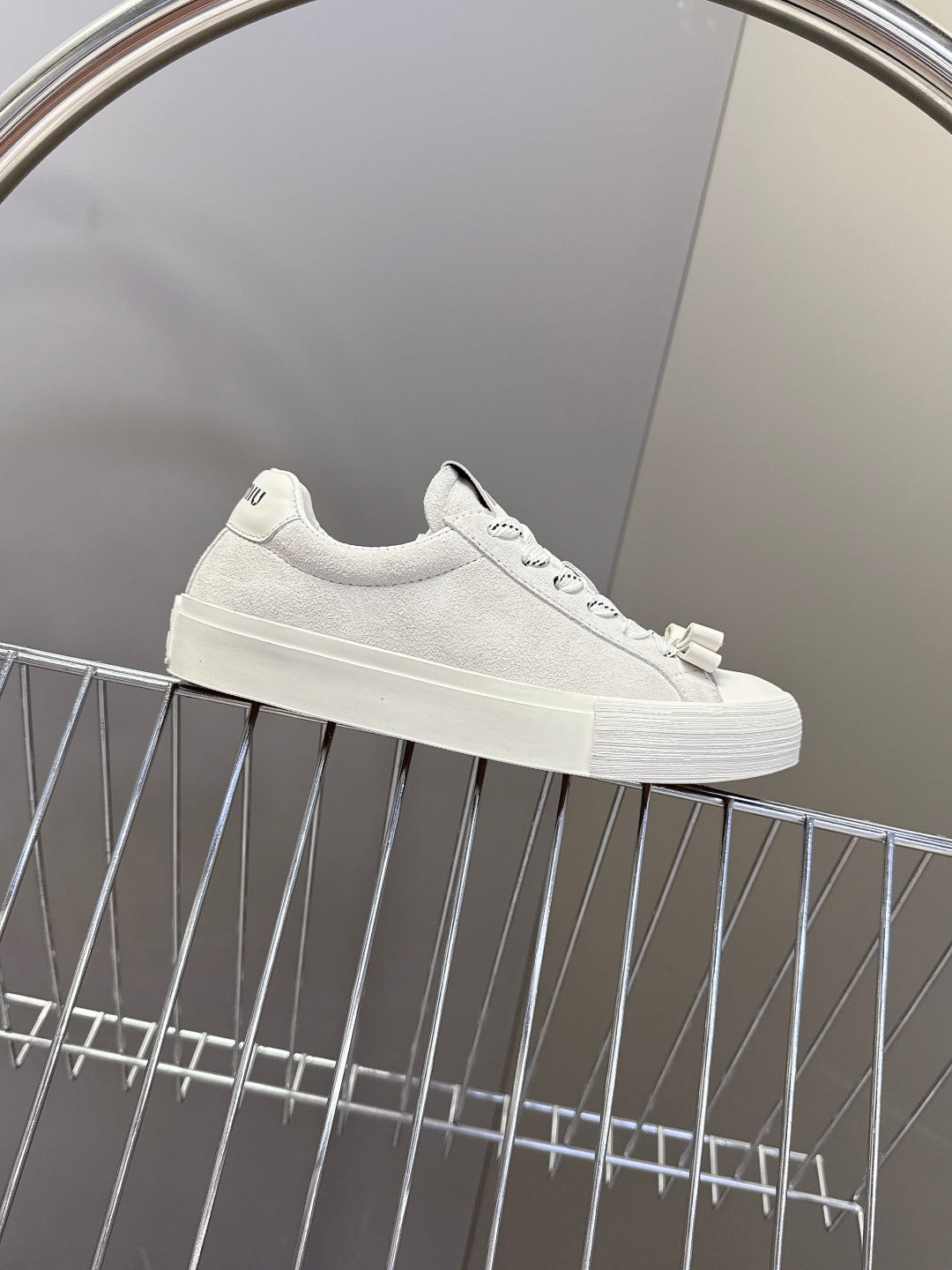 MIUMIU 25S SNEAKERS IN WHITE SUEDE