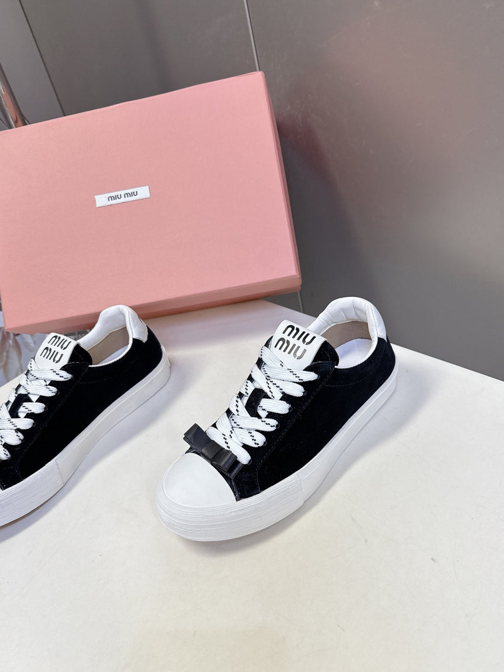 MIUMIU 25S SNEAKERS IN BLACK SUEDE