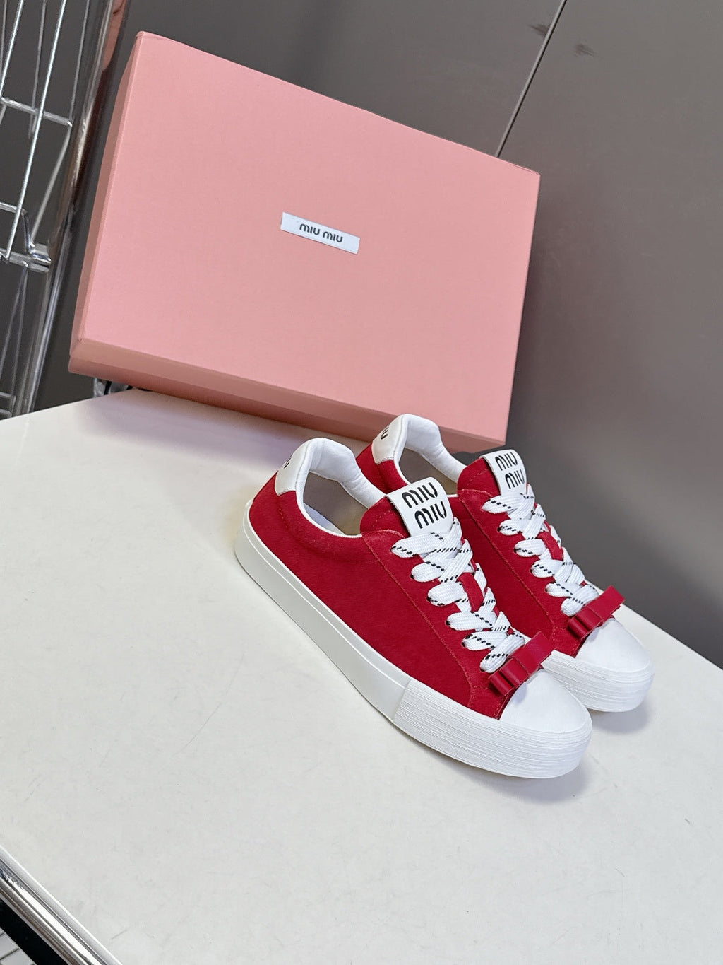 MIUMIU 25S SNEAKERS IN DARK RED SUEDE