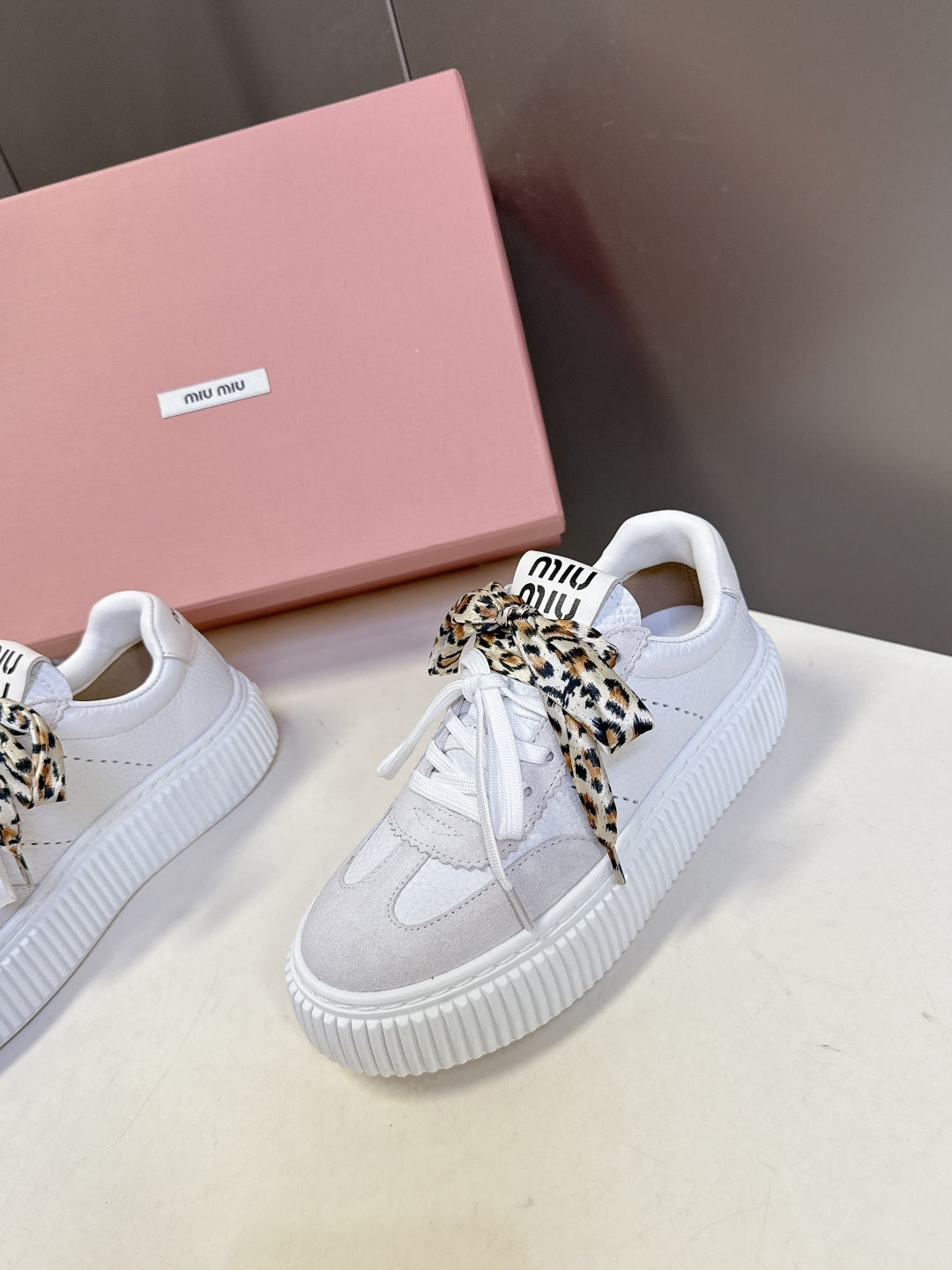 MIUMIU 25S SNEAKERS 45NN IN WHITE SUEDE WITH LEOPARD-PRINT LACES