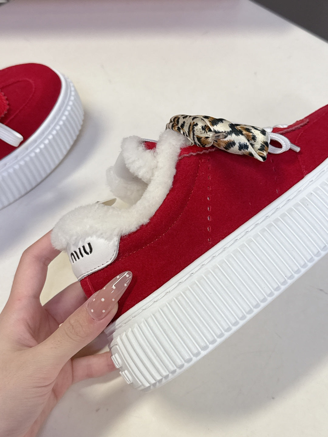 MIUMIU 25S SNEAKERS 45MM IN DARK RED SUEDE WITH LEOPARD-PRINT LACES SHEARLING