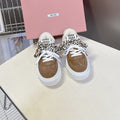 MIUMIU 25S SNEAKERS 45MM IN EARTH BROWN SUEDE WITH LEOPARD-PRINT LACES SHEARLING