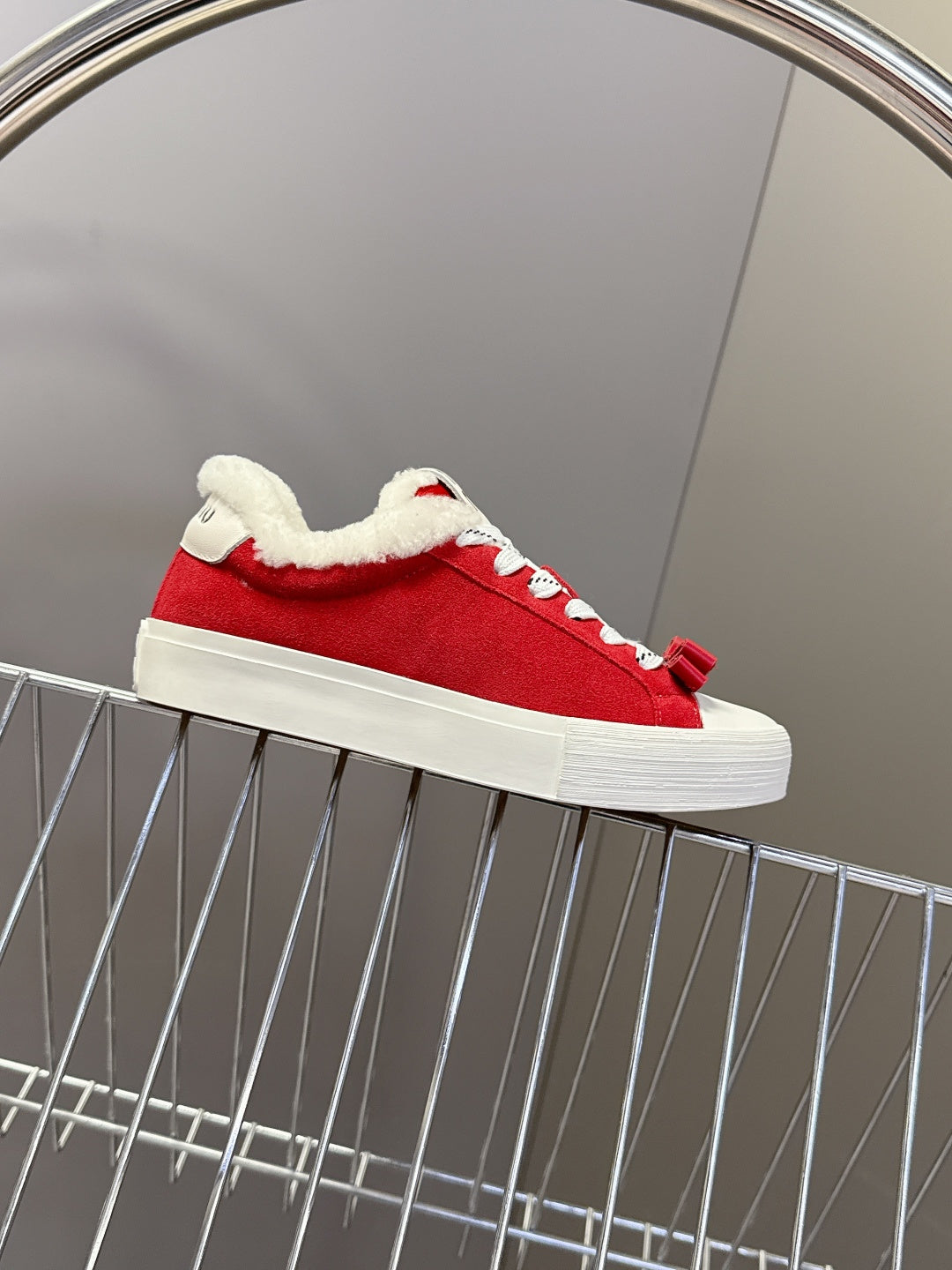 MIUMIU 25S SNEAKERS IN DARK RED SUEDE WITH SHEARLING