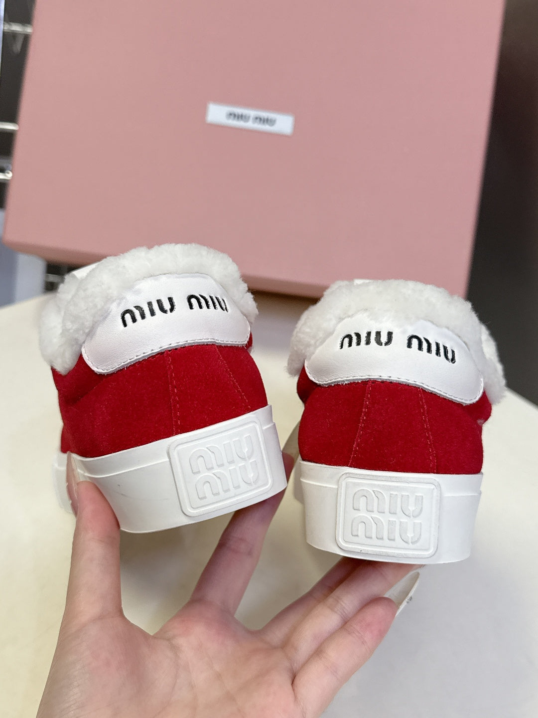 MIUMIU 25S SNEAKERS IN DARK RED SUEDE WITH SHEARLING